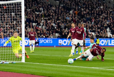 Kyle Walker-Peters denies Hugo Bueno the early chance for Wolves.