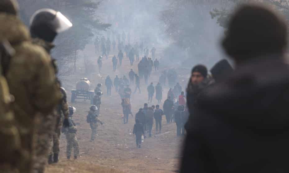 Migrants in a camp on the Belarusian-Polish border in the Grodno region