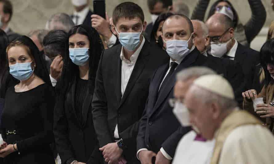 Ukrainian lawmakers (from left) Olena Khomenko, Maria Mezentseva, Melitopol mayor Ivan Fedorov and Rustem Umerov look as Pope Francis passes by at the Vatican.