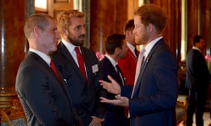 Prince Harry speaks with England head coach Stuart Lancaster and captain Chris Robshaw.
