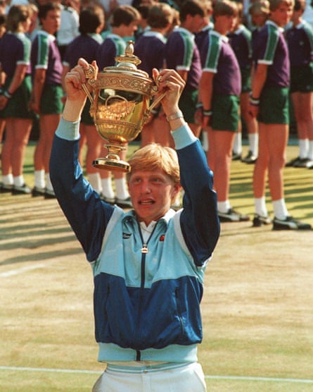 Becker holding the Wimbledon trophy aloft in 1985.