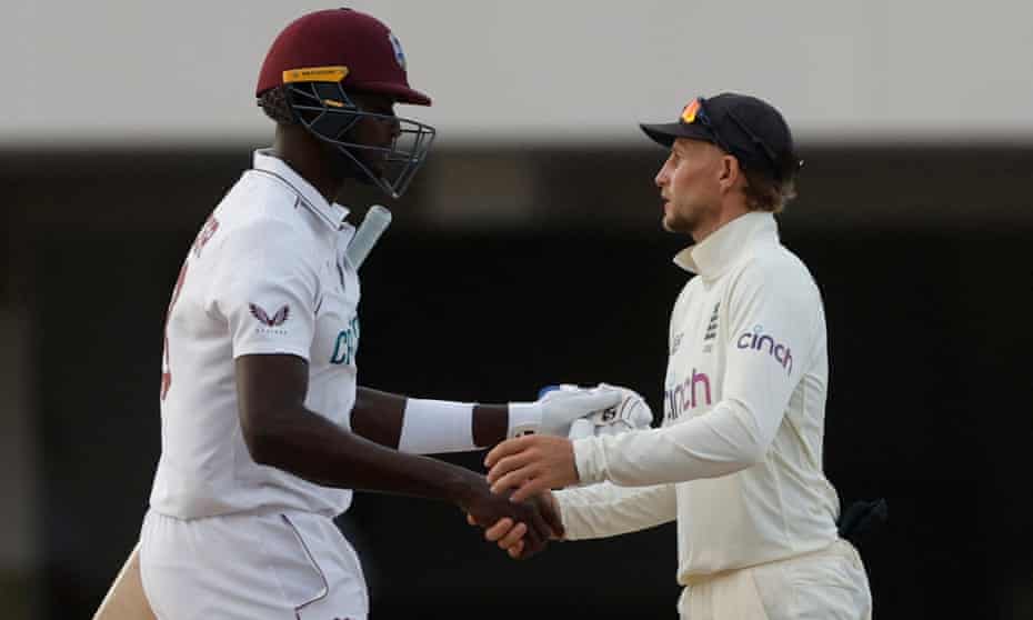 West Indies' Jason Holder shakes hands with Joe Root after the draw with England in last week’s first Test.