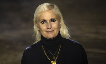 Designer Maria Grazia Chiuri acknowledges applause after her spring /summer 2020 collection for Christian Dior was unveiled at the Paris fashion week.