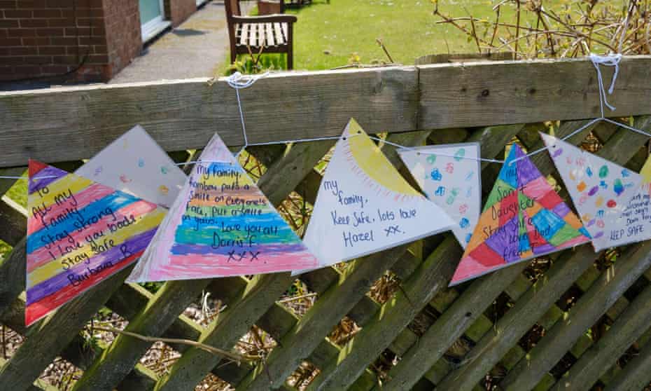 Messages to loved ones tied to the fence outside a nursing home during the coronavirus lockdown.