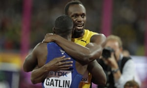 Usain Bolt embraces Justin Gatlin after the final of the men’s 100m final.