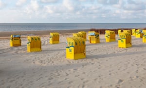 A photo taken on May 2, 2020 shows an empty beach with closed wicker chairs in the northern German city of Duhnen, near Cuxhaven, on the North Sea, in the midst of the new coronavirus pandemic.