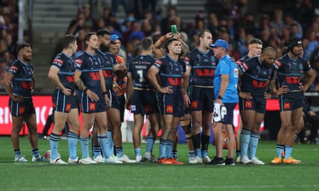 Blues players look dejected after conceding a try.