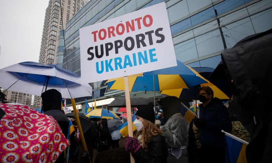 People rally outside the Ukrainian consulate in Toronto.