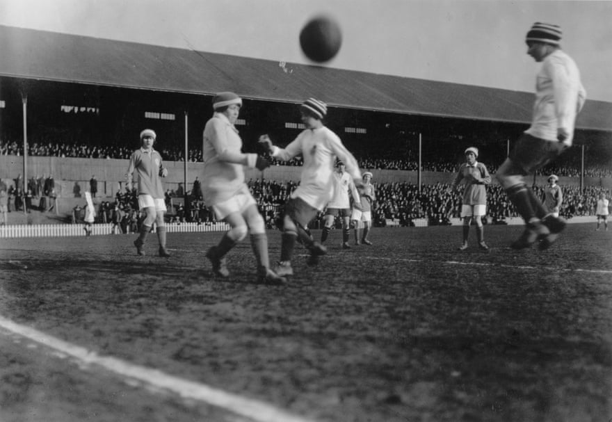 Action from a 1921 fundraising match in aid of former servicemen between Scottish XI and Dick, Kerr Ladies, in front of a big crowd at Tynecastle in Edinburgh, which the English team won 13-0.