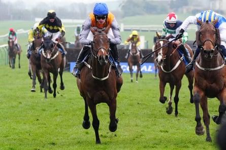 Captain Cody, ridden by Harry Cobden, on his way to winning the Scottish Grand National last year.