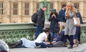 Woman visibly distressed passing the scene of the terrorist incident on Westminster Bridge