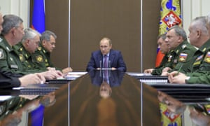 Vladimir Putin and defence chiefs.