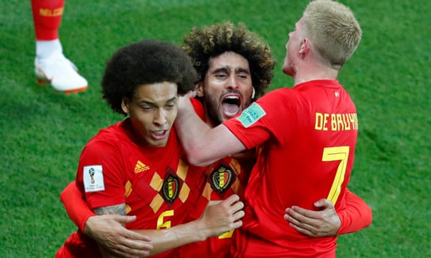 Marouane Fellaini (centre) celebrates scoring Belgium’s equaliser against Japan in the last 16.