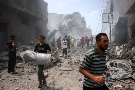 The aftermath of an Israeli airstrike on Gaza City's southern al-Zeitoun neighbourhood.