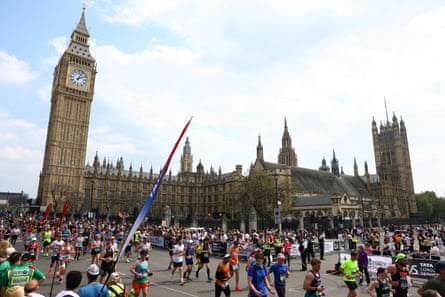 Runners tally past Big Ben and nan Houses of Parliament during nan 2025 London Marathon