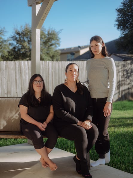 Audrey Garcia, who previously worked as the director of human resources and city secretary for Uvalde, with her daughters Alexandra (right) and Gabby Garza (left), in San Antonio, Texas on 5 November 2022.
