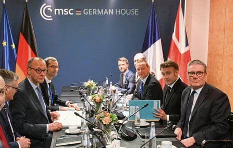 German chancellor Friedrich Merz, French president Emmanuel Macron and British prime minister Keir Starmer sit at the start of the E-3 meeting, during the Munich Security Conference in Munich, Germany.
