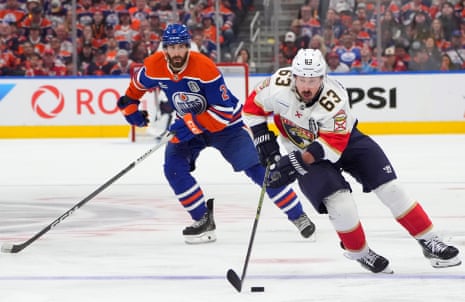 two men playing hockey