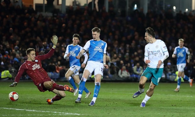 Jack Grealish scores Manchester City’s second goal at Peterborough