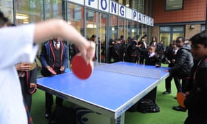 boys playing ping pong