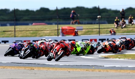 Marc Márquez leads into the first corner at the start of the afternoon