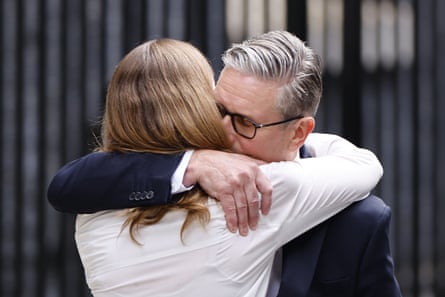 The Starmers hug each other