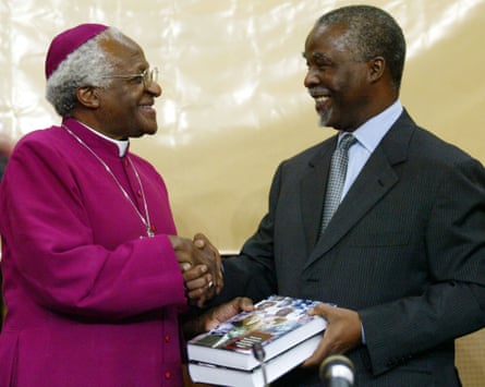 Tutu and Mbeki shake hands