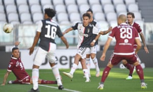 Paulo Dybala (centre) of Juventus scores the opening goal.