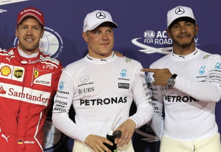Valtteri Bottas is flanked by Sebastian Vettel and Lewis Hamilton after taking pole.