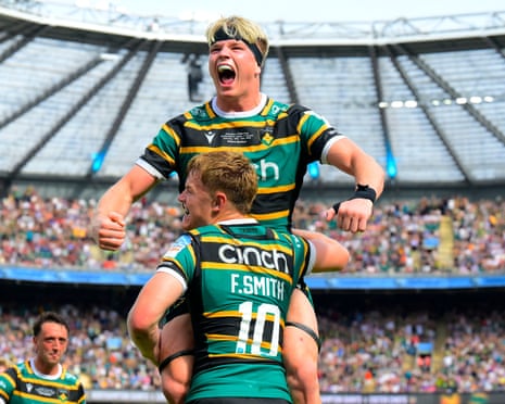 Henry Pollock celebrates atop Fin Smith's shoulders after Northampton Saints' win the Prem final.