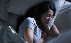 Woman in bed in the dark<br>GettyImages-72883469