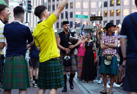 A bagpiper serenades Scotland fans in Boston, the scene of their Group C opener against Haiti