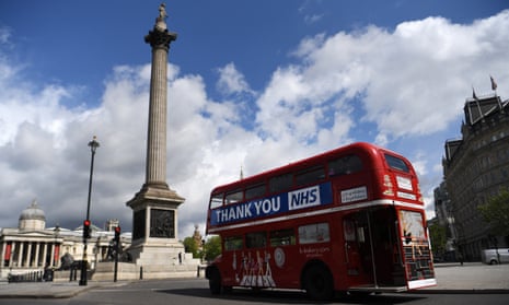 A ‘hop on, hop off’ London Routemaster bus sporting a tribute to the NHS rides past Trafalgar Square in 2020.