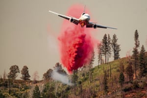 Mariposa, US: An air tanker drops retardant in efforts to stop a wildfire from reaching the Lushmeadows community in Mariposa county, California
