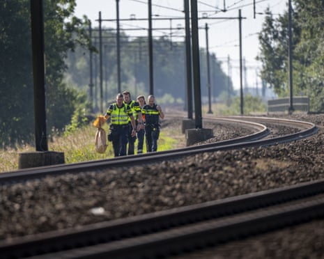 ProRail and police employees along the tracks in the Netherlands.