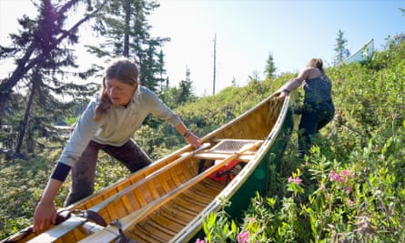 The trip used traditional wood-canvas canoes.