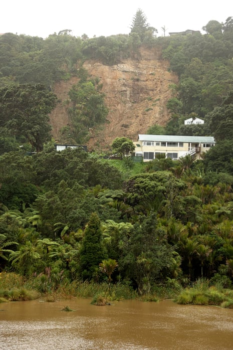 A landslide threatens houses in the coastal suburb of Muriwai in Auckland.