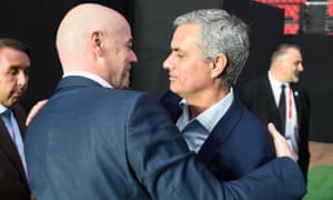 Mourinho keeps the Fifa president Gianni Infantino at arms length ahead of the Legends game in Mexico City.