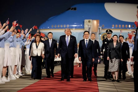 Donald Trump with China’s vice-president, Han Zheng, during an arrival ceremony at Beijing Capital International Airport, China, 13 May.
