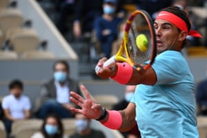 Rafael Nadal returns the ball to Diego Schwartzman.
