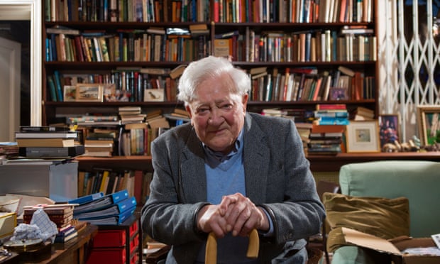 Richard Adams at home with his books in 2014.