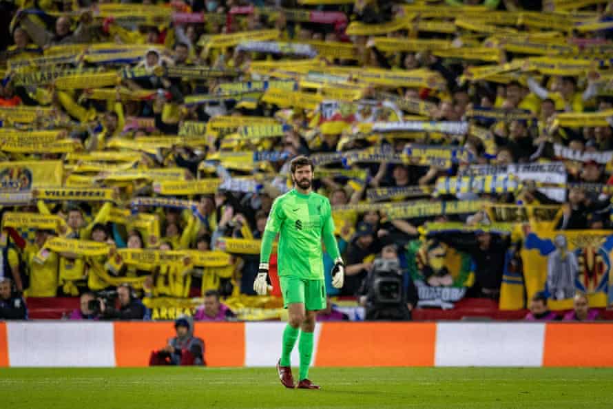 Liverpool goalkeeper Alisson Becker watches the action in the first half.