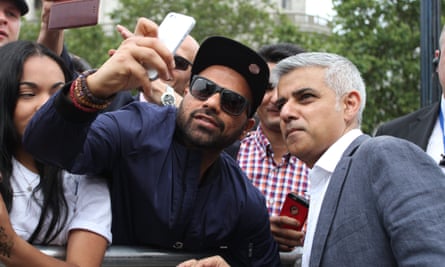 Mayor of London Sadiq Khan posing for a selfie during Eid celebrations in Trafalgar Square