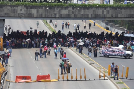 Mexican teachers block an avenue during a national teachers’ strike on Tuesday.