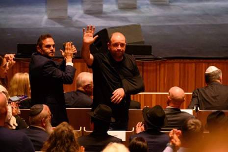 Ahmed Al-Ahmed waves to the crowd