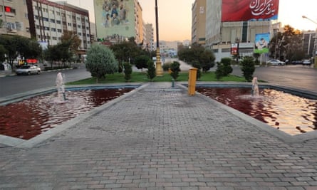 Fountains in Fatemi Square in Tehran with water dyed red.