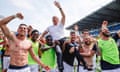Cagliari's players carry head coach Claudio Ranieri across the pitch after securing survival in Serie A with a 2-0 win at Sassuolo.