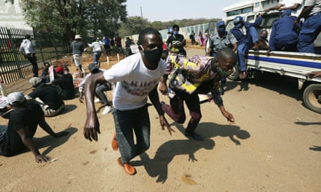 Zimbabwe University students flee police