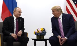 Donald Trump, right, meets with Russian president Vladimir Putin during a G-20 summit in Osaka, Japan on 28 June 2019.