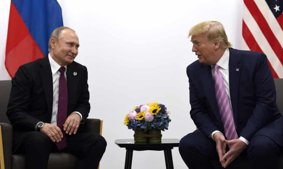 Donald Trump, right, meets with Russian president Vladimir Putin during a G-20 summit in Osaka, Japan on 28 June 2019. 
